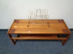 A mid 20th century teak refectory coffee table with undershelf, width 111cm,