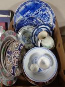 A box of Oriental ceramics, wall plaques,