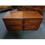 A pair of G Plan two drawer bedside chests in a mahogany finish