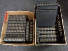 Two boxes of Encyclopedia Britannica