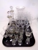 A tray of antique glass decanters,