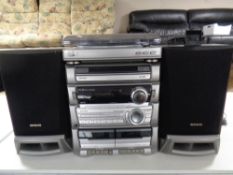 An Aiwa hifi with remote and speakers