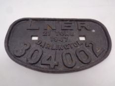 An LNER cast iron train plaque