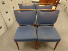 A set of four Scandinavian mid century chairs upholstered in blue fabric