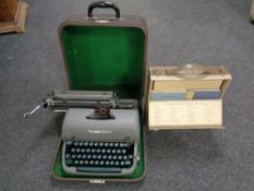 A vintage Remington typewriter in case together with a mid century Linguaphone set