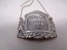 An Israeli silver decanter label