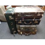 Five vintage luggage cases