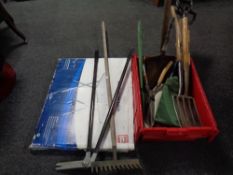 A plastic crate containing a quantity of garden tools, together with a wooden trellis,