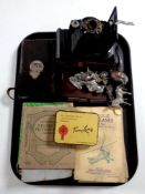 A tray of folding camera, plated and pewter figures, cigarette card albums,