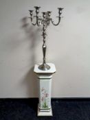 An Italian hand painted plant pedestal by Zanatto together with a metal five way table candelabrum