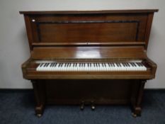 A Bremar mahogany cased overstrung upright piano