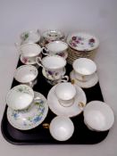 A set of twelve Royal Albert flower of the month series bone china teacups and saucers,