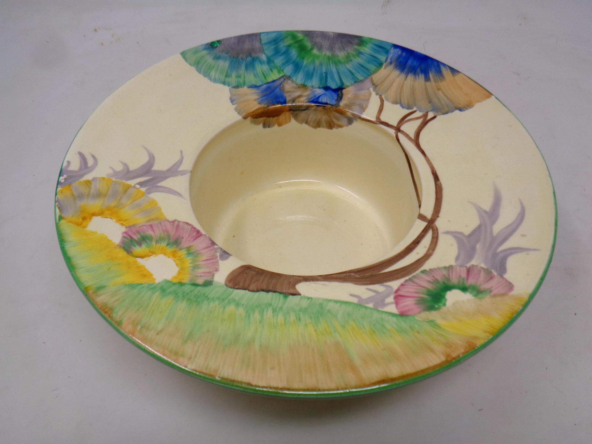 A Clarice Cliff Bizarre hand painted Rhodanthe pattern bowl, diameter 25.3 cm.