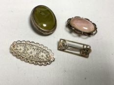 Four vintage silver brooches