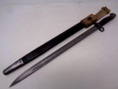 An early 20th century Wilkinson bayonet in scabbard