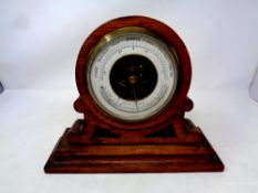 An early 20th century oak holosteric barometer