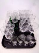 A tray of assorted crystal drinking glasses to include Edinburgh Crystal wine glasses