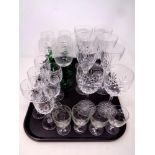 A tray of assorted crystal drinking glasses to include Edinburgh Crystal wine glasses