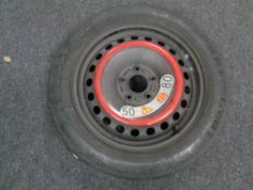 A car spare wheel with Pirelli tyre