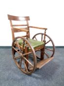 A 19th century mahogany invalid's wheelchair,