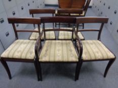 A set of five dining chairs upholstered in Regency striped fabric