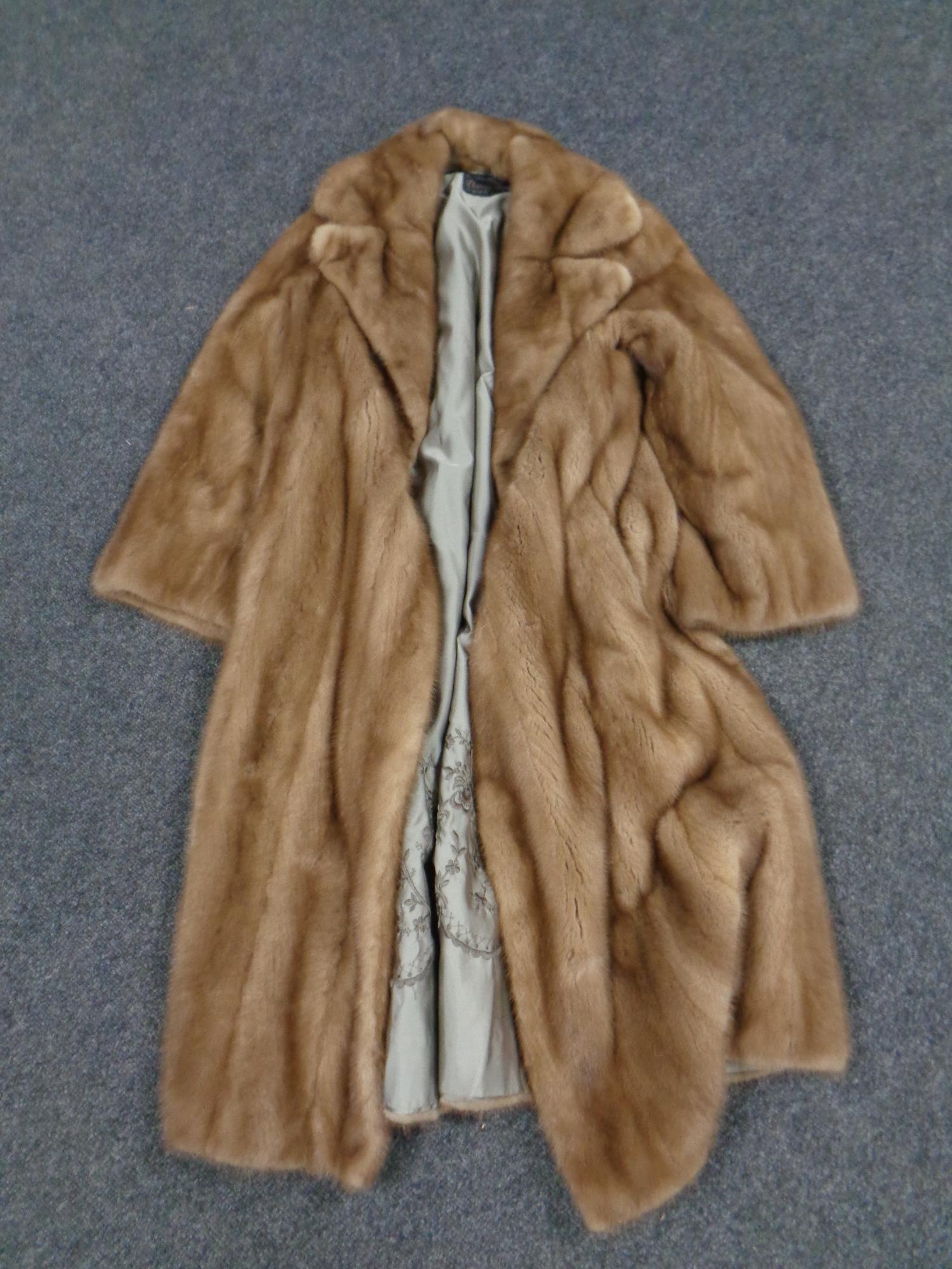 A three quarter length mink coat by Baray furs of Liverpool