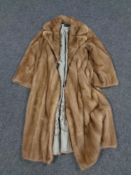 A three quarter length mink coat by Baray furs of Liverpool