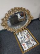 A contemporary gilt framed mirror of grape design together with an Art Deco postcard montage in