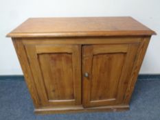 A pine double door low cabinet