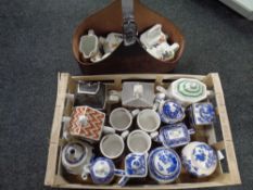 A crate and leather caddy containing Ringtons teapots, coffee pots, water jugs,