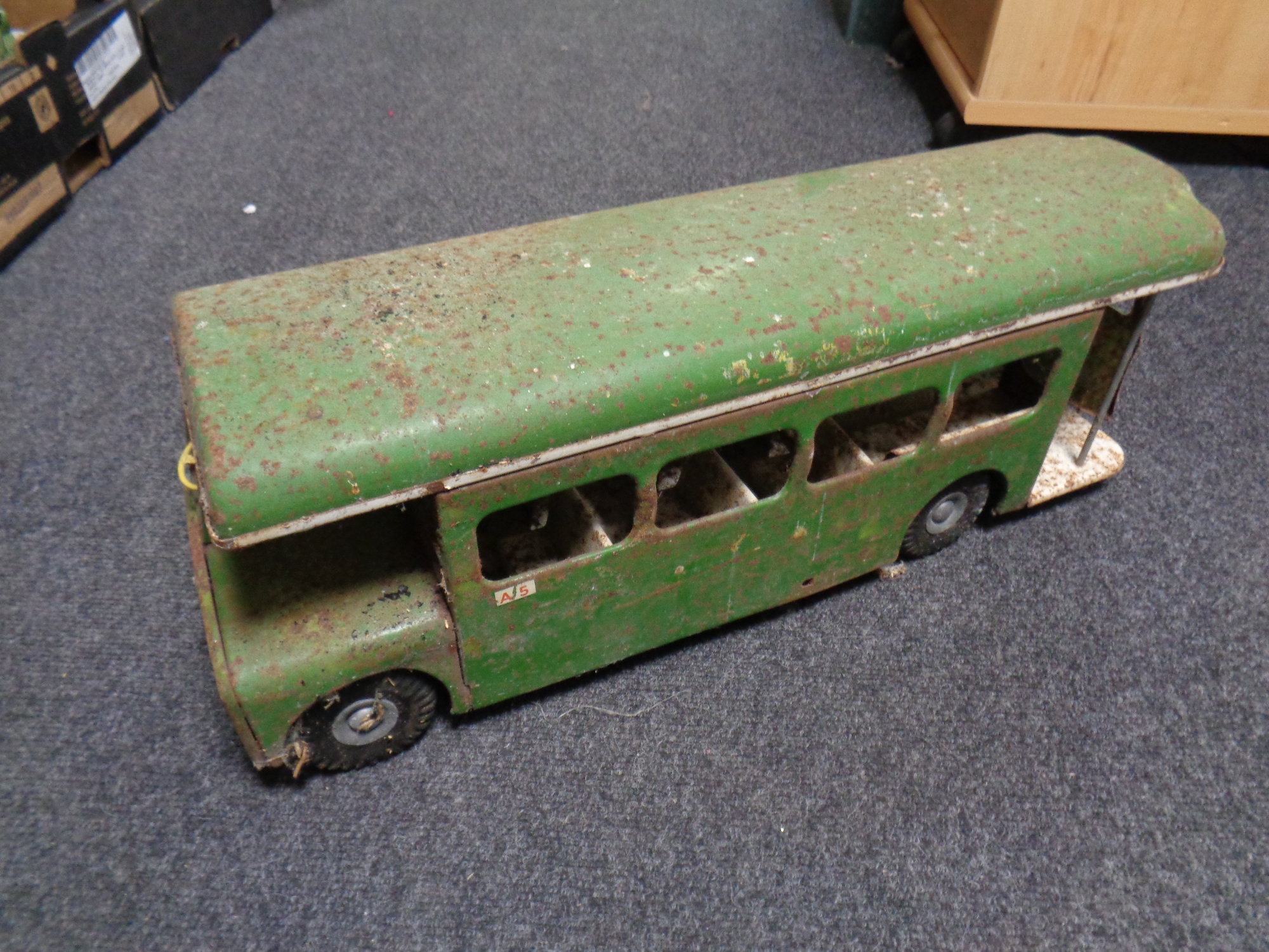 A twentieth century tin plate bus, length 57 cm.