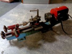 A Faircut lathe with motor and accessories