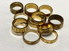 Twelve brass sample wedding bands