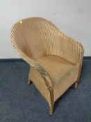 A gold loom armchair