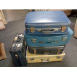 Five 20th century luggage cases to include Revelation, Antler,