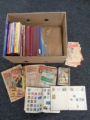 A box of Oor Wullie and The Broons annuals, two 20th century stamp albums containing world stamps,