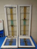 Four antique stained leaded glass windows in original frames
