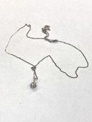 A 14ct white gold necklace with diamond pendant, 1.8g. diamond approximately 3mm diameter.
