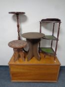 A 20th century blanket box together with a three tier corner whatnot stand and similar wine table,