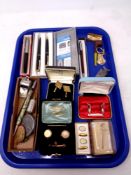 A tray of gent's cuff links, boxed pens including Parker, Swan & Waterman, miniature pipe,