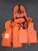 Three floatation vests