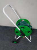 A hose pipe on reel and trolley