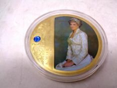 A commemorative presentation coin 'Portraits of Princess Diana'