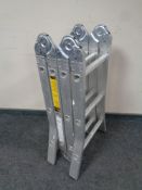 An ABRU aluminium folding multi function ladder