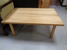 A rectangular pine coffee table