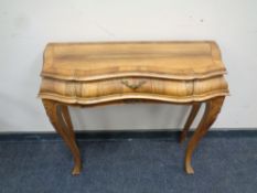 A 19th century inlaid walnut shaped front console table on cabriole legs