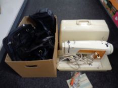 A Frister Rossmann model 45 electric sewing machine with foot pedal in case, box of hand bags,
