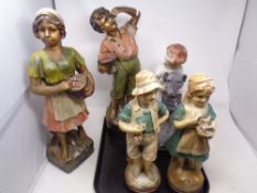 A tray of five early 20th century painted chalk figures