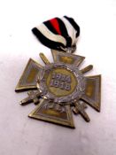 A German World War I Honour Cross medal on ribbon