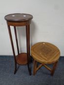 An Edwardian two tier plant stand and an occasional table